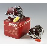2x Early Penn level wind reels - Penn Peer 309 and 209 both with stainless steel frame and spools,