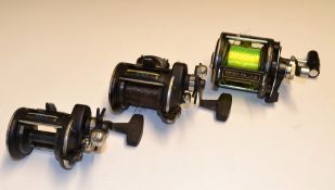 3x various Penn Graphite sea reels - Penn 45GLS graphite lever Senator; Penn 555 and Penn 535 both