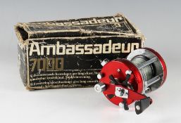 Abu Ambassadeur 7000 salt water level wind reel: Red end plates, spare spool - foot stamped 770101 -