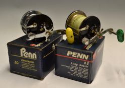 2x Penn Long Beach Bait Casting Sea Reels - 65 and 60 models, star drag system, stainless steel