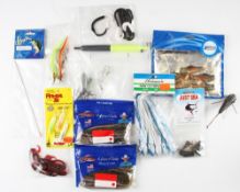 Large quantity of Sea Fishing tackle and accessories: many unopened packets of lures incl Amega soft