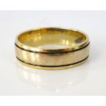 NINE CARAT GOLD WEDDING BAND with band detail, ring size V-W, approximately 5.