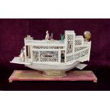 19th CENTURY CHINESE CARVED IVORY PLEASURE BOAT with overall pierced decoration and carved figures,