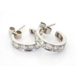 PAIR OF DIAMOND HOOP EARRINGS in unmarked white gold, the diamonds totalling approximately 0.