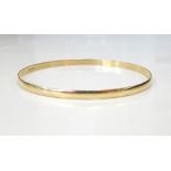 NINE CARAT GOLD BANGLE approximately 6.