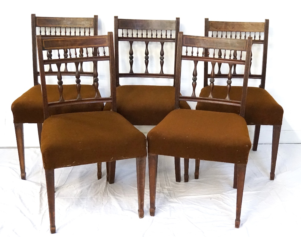 FIVE MATCHING EDWARDIAN MAHOGANY DINING CHAIRS with decorative backrests,