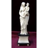 19th CENTURY CARVED IVORY MADONNA AND CHILD Dieppe, France, mounted on a shaped plinth,