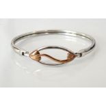 CLOGAU SILVER 'THROUGH THESE EYES' BANGLE with rose gold heart motif decoration