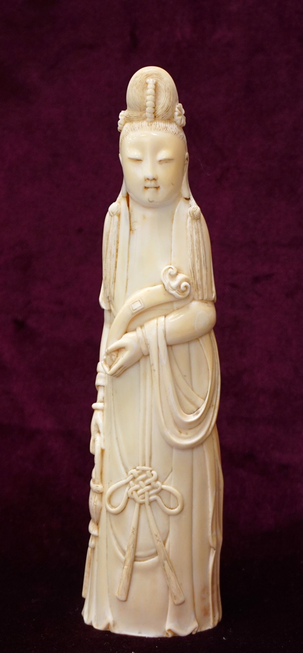 19th CENTURY CHINESE CARVED IVORY FIGURE OF GUAN YIN holding a ruyi in one hand and a basket of