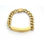 NINE CARAT GOLD IDENTITY BRACELET the central blank identity panel flanked by curb link chains to