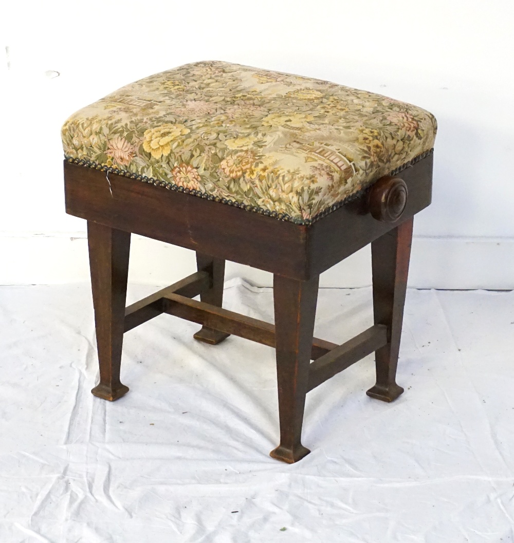 ADJUSTABLE PIANO STOOL the embroidered seat with stud decoration flanked by a pair of turned