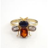 UNUSUAL SAPPHIRE, CITRINE AND DIAMOND BEE RING the bee with sapphire head,