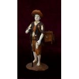 IN THE MANNER OF SIMON TROGER an 18th century German carved ivory and stained wood model of a