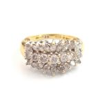 IMPRESSIVE DIAMOND CLUSTER DRESS RING the central row of round brilliant cut diamonds with marquise