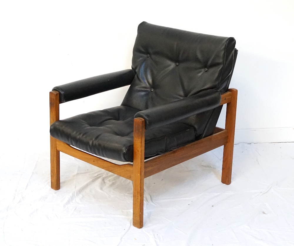 RETRO BUTTON BACK ARMCHAIR with padded arms and a button seat, in black leatherette,