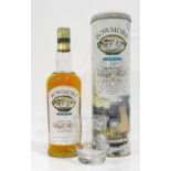 BOWMORE LEGEND A bottle of Bowmore Single Malt Scotch Whisky in a limited edition tin depicting