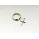 FOURTEEN CARAT GOLD WEDDING BAND ring size M, and a fourteen carat gold cross pendant,