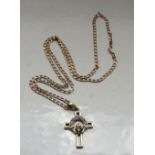 NINE CARAT GOLD PASTE SET CROSS PENDANT on nine carat gold neck chain