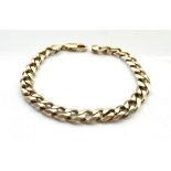 NINE CARAT GOLD CURB LINK BRACELET 20.3cm long and approximately 17.