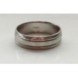 PLATINUM WEDDING BAND with banded detail, ring size Z, approximately 7.