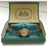 LADIES AVIA NINE CARAT GOLD CASED WRISTWATCH the dial with Arabic and baton markers,