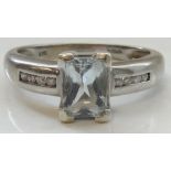 AQUAMARINE AND DIAMOND DRESS RING the central radiant cut aquamarine approximately 0.