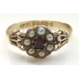 VICTORIAN RUBY AND SEED PEAL CLUSTER RING the central ruby in seed pearl surround,