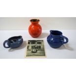 ANTON LANG POTTERY JUG in deep blue and marked to the base, 6.