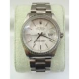 GENTLEMAN'S ROLEX OYSTER PERPETUAL DATE JUST WRISTWATCH with a silvered dial, baton hour markers,