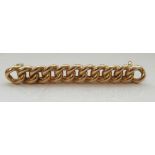 UNMARKED GOLD BAR BROOCH formed as a curb link chain