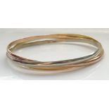 EIGHTEEN CARAT GOLD RUSSIAN WEDDING RING STYLE TRIPLE BANGLE comprising intertwined white,