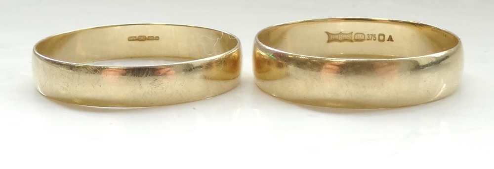 TWO NINE CARAT GOLD WEDDING BANDS both ring size U, total weight approximately 3.