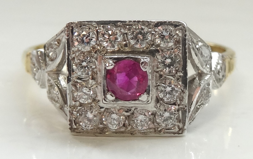 RUBY AND DIAMOND CLUSTER RING the ruby and surrounding twelve diamonds in square setting,