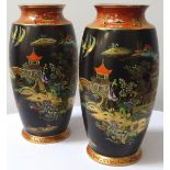 PAIR OF CARLTON WARE VASES decorated in the Mikado pattern with a black ground and gilt decoration