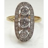 ART DECO STYLE DIAMOND PLAQUE RING the three central vertical bezel set diamonds in multi diamond