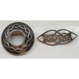 SILVER BROOCH of entwined design; together with a Swedish circular brooch,