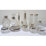 SELECTION OF VARIOUS SILVER TOPPED DRESSING TABLE BOTTLES AND JARS including two tapering bottles