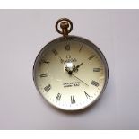 SPHERICAL GLOBE DESK CLOCK with Roman numerals to the dial and a top winder,
