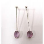 PAIR OF AMETHYST SET DROP EARRINGS in nine carat white gold,