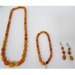 BUTTERSCOTCH ABMER BEAD NECKLACE the largest approximately 2.