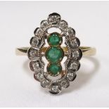 EMERALD AND DIAMOND CLUSTER DRESS RING the three graduated emeralds in vertical setting and in