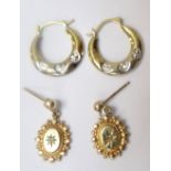 TWO PAIRS OF NINE CARAT GOLD EARRINGS each set with a small diamond, total weight approximately 1.