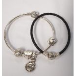 PANDORA MOMENTS SILVER CHARM BANGLE with sparkling star clasp, three charms and a clip,