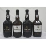 FOUR BOTTLES OF DELAFORCE PORT