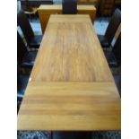 TEAK EXTENDING DINING TABLE