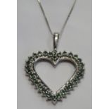 GREEN GEM SET HEART PENDANT in nine carat white gold,