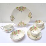 'ROYAL ALBERT' CHINA TEA SERVICE with floral decoration on white ground, comprising six cups,