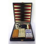 CASED GAMES COMPENDIUM opening to reveal a backgammon and chess/draughts board, poker dice,