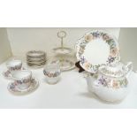 PARAGON COUNTRY LANE TEA SERVICE decorated with a white ground with a colourful floral border and