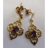 AMETHYST DROP EARRINGS in unmarked gold settings of pierced quatrefoil design